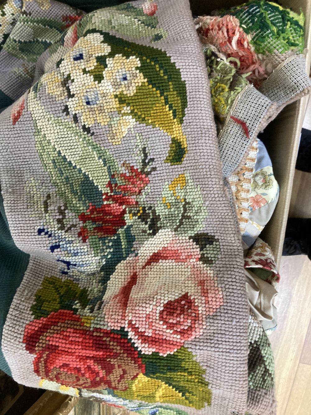 A floral tapestry apron piece, together with a further patchwork cover (2)